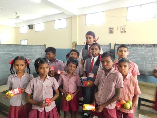  Joy multiplies when it is shared among the less fortunate. The children of St. Joseph’s joyfully shared goodies during the season of Christmas with the students of Dominic Savio Primary School, Perambur.